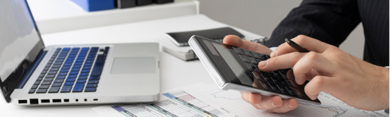 man calculating his budget and expenses